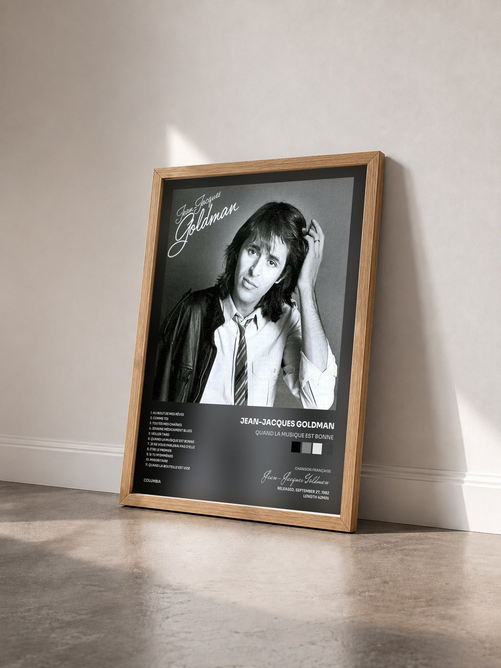 #bois Tableau de l'album Quand la musique est bonne de Jean-Jacques Goldman vu de trois quarts, cadre en bois brut