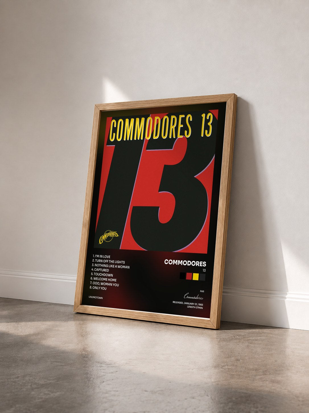 #bois Tableau de l'album 13 de Commodores vu de trois quarts, cadre en bois brut