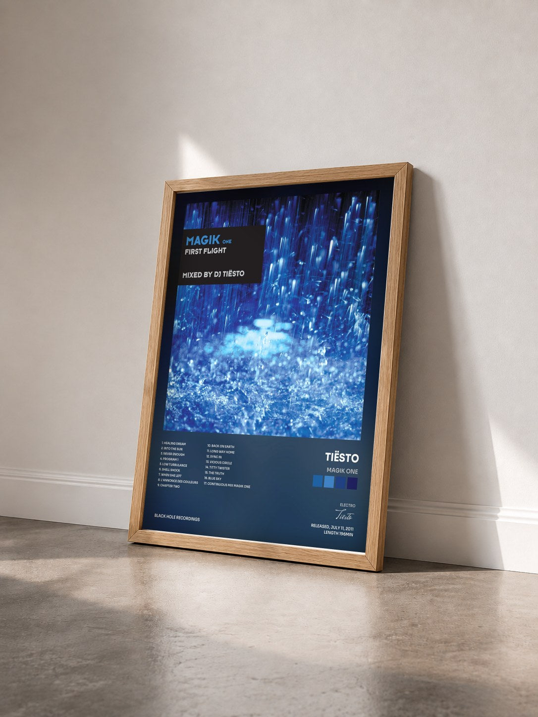 #bois Tableau de l'album Magik One de Tiësto vu de trois quarts, cadre en bois brut