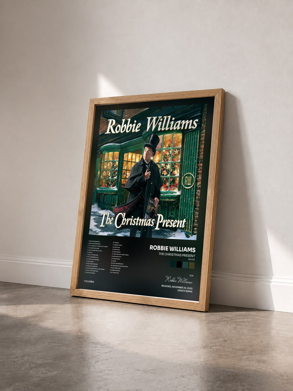 #bois Tableau de l'album The Christmas Present (Deluxe) de Robbie Williams vu de trois quarts, cadre en bois brut