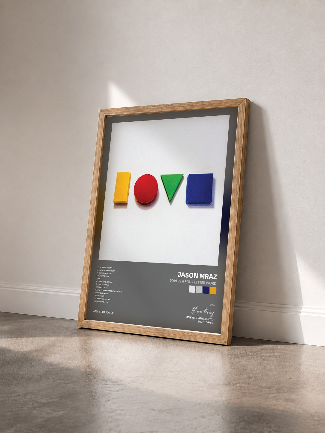 #bois Tableau de l'album Love Is a Four Letter Word de Jason Mraz vu de trois quarts, cadre en bois brut
