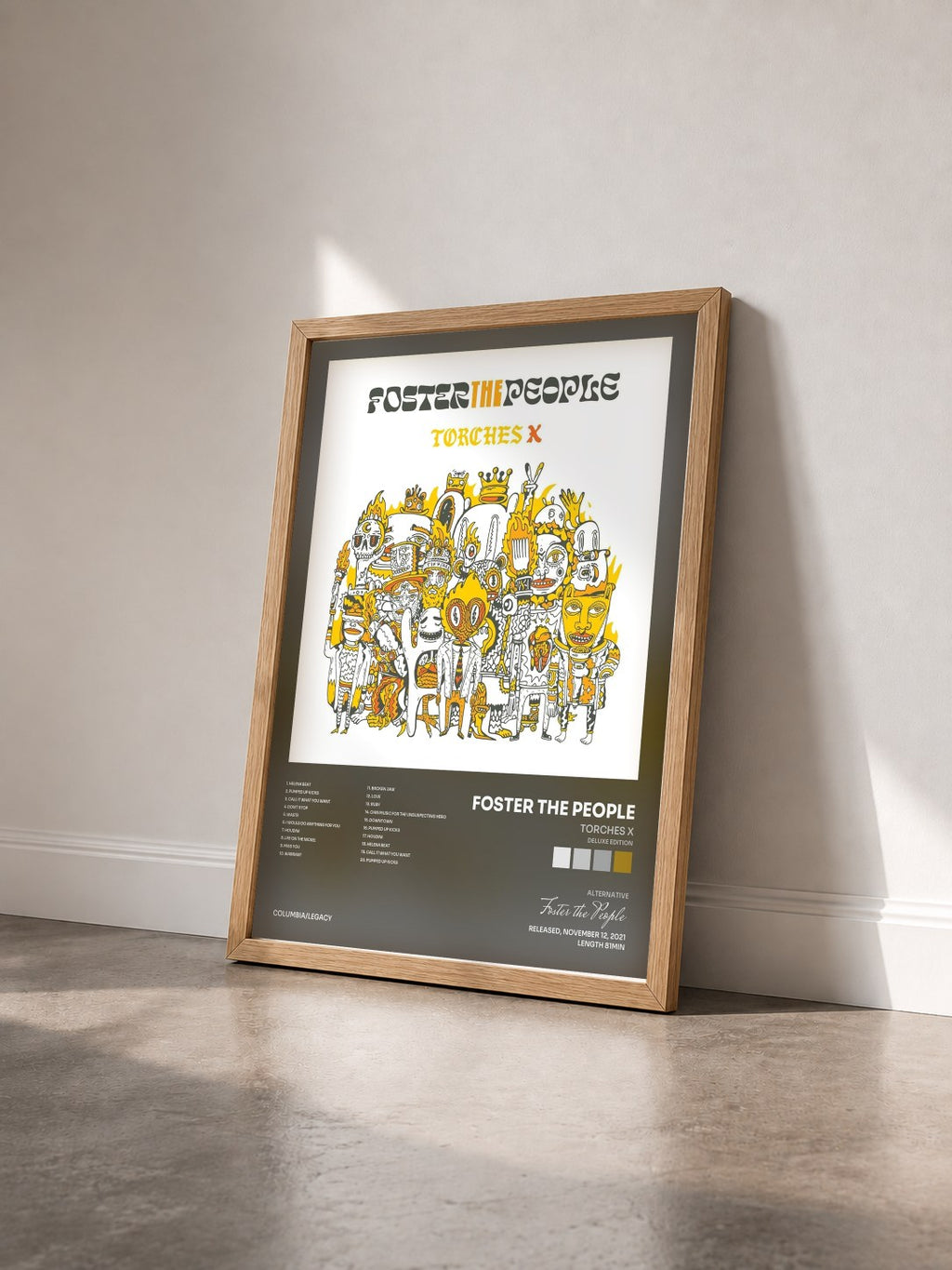 #bois Tableau de l'album Torches X (Deluxe Edition) de Foster the People vu de trois quarts, cadre en bois brut