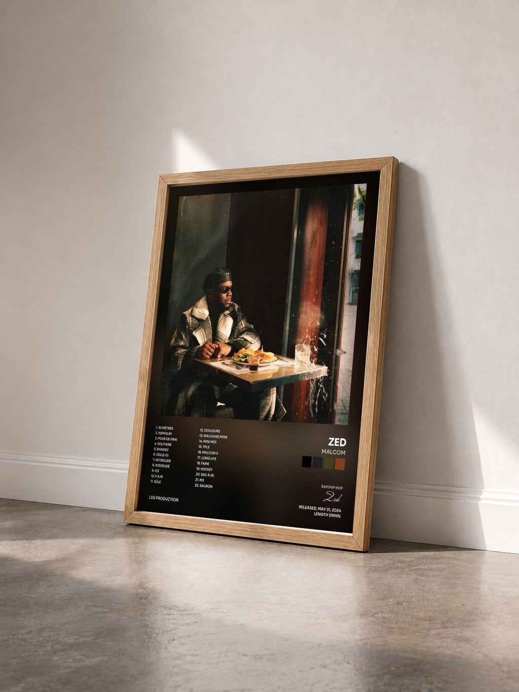 #bois Tableau de l'album Malcom de Zed vu de trois quarts, cadre en bois brut