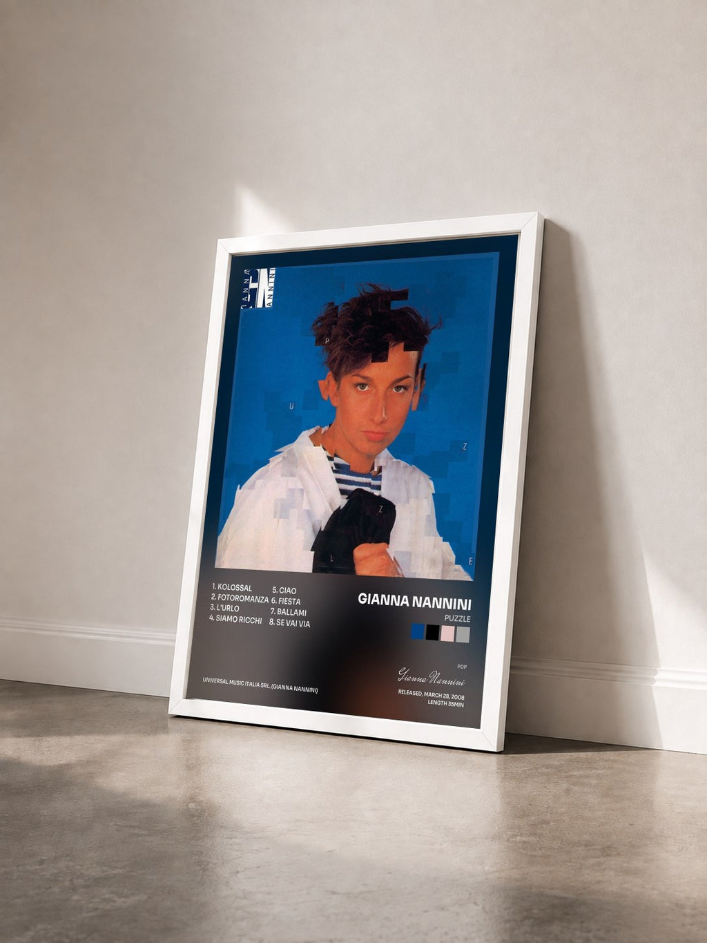 #blanc Tableau de l'album Puzzle de Gianna Nannini vu de trois quarts, cadre blanc