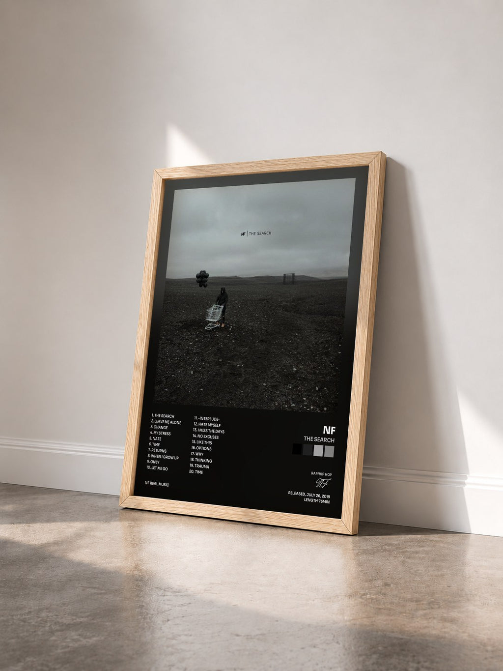 #bois Tableau de l'album The Search de NF vu de trois quarts, cadre en bois brut