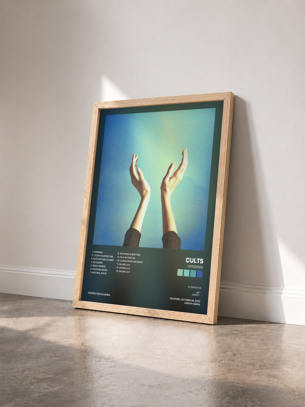 #bois Tableau de l'album Offering de cults vu de trois quarts, cadre en bois brut
