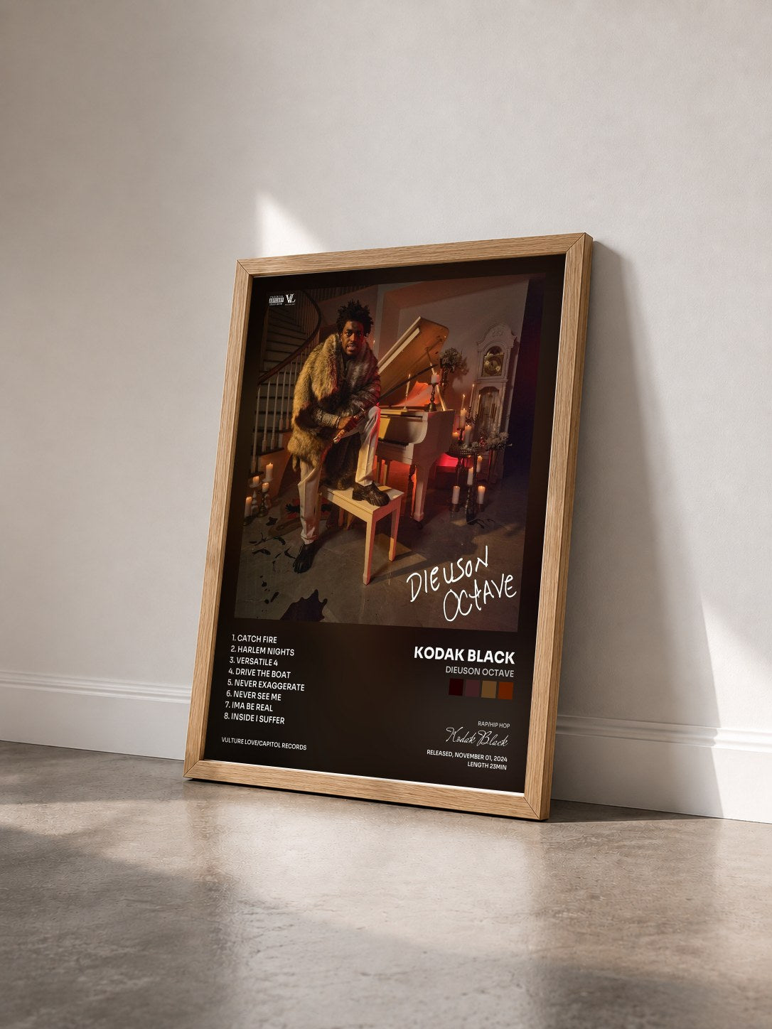 #bois Tableau de l'album Dieuson Octave de Kodak Black vu de trois quarts, cadre en bois brut
