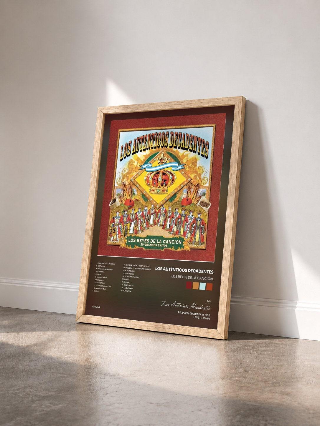 #bois Tableau de l'album Los Reyes de la Canción de Los Auténticos Decadentes vu de trois quarts, cadre en bois brut