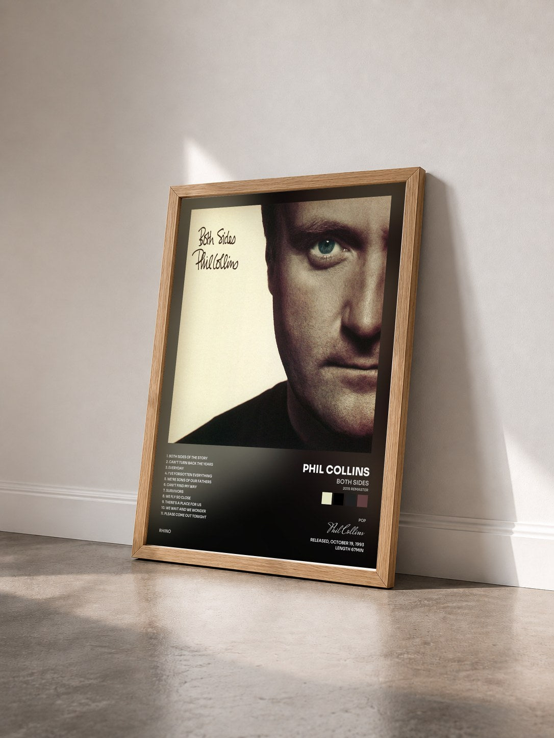 #bois Tableau de l'album Both Sides (2015 Remaster) de Phil Collins vu de trois quarts, cadre en bois brut