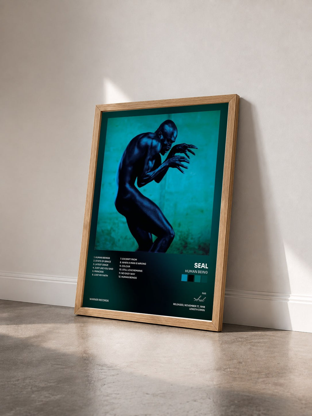 #bois Tableau de l'album Human Being de Seal vu de trois quarts, cadre en bois brut
