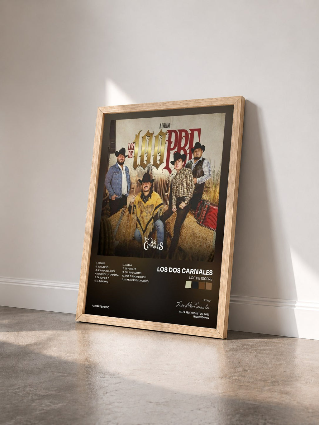 #bois Tableau de l'album Los de 100pre de Los Dos Carnales vu de trois quarts, cadre en bois brut