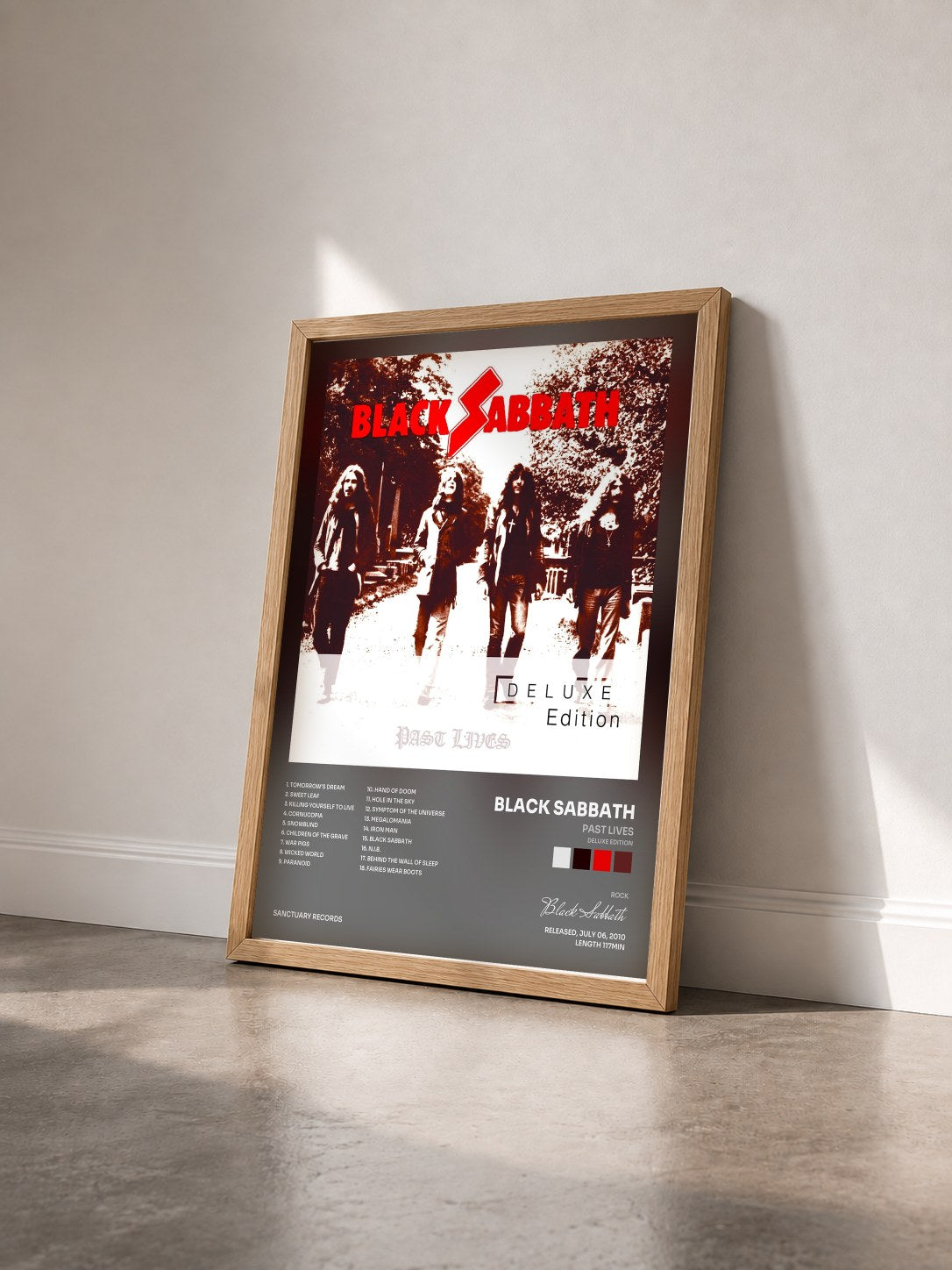 #bois Tableau de l'album Past Lives (Deluxe Edition) de Black Sabbath vu de trois quarts, cadre en bois brut