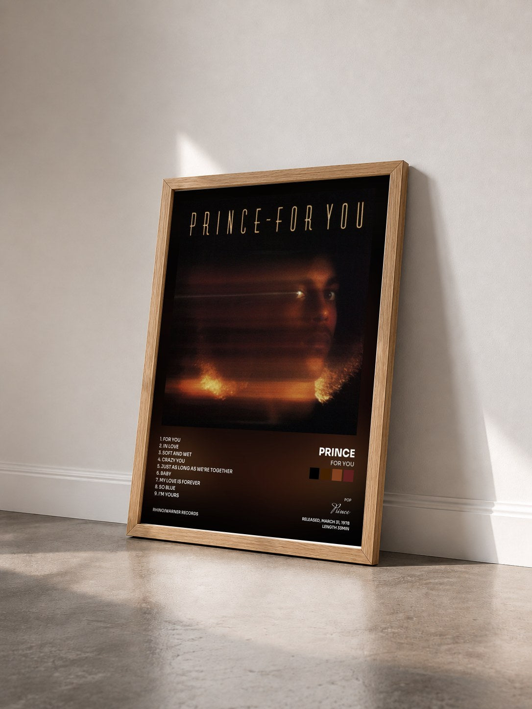 #bois Tableau de l'album For You de Prince vu de trois quarts, cadre en bois brut