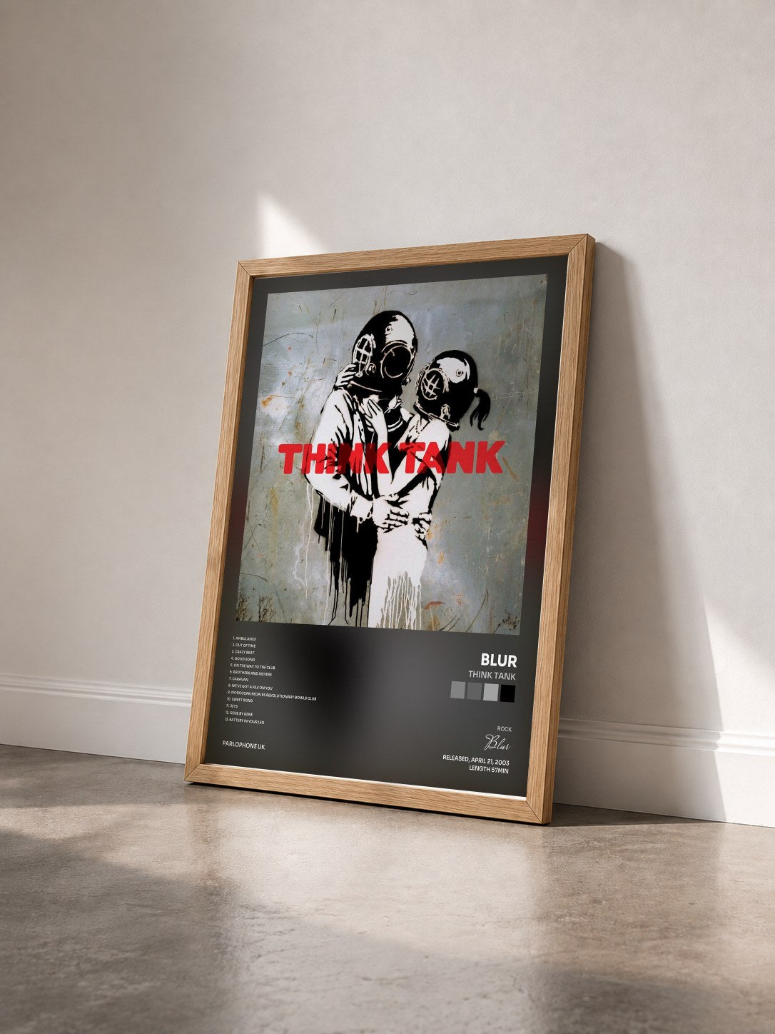 #bois Tableau de l'album Think Tank de Blur vu de trois quarts, cadre en bois brut