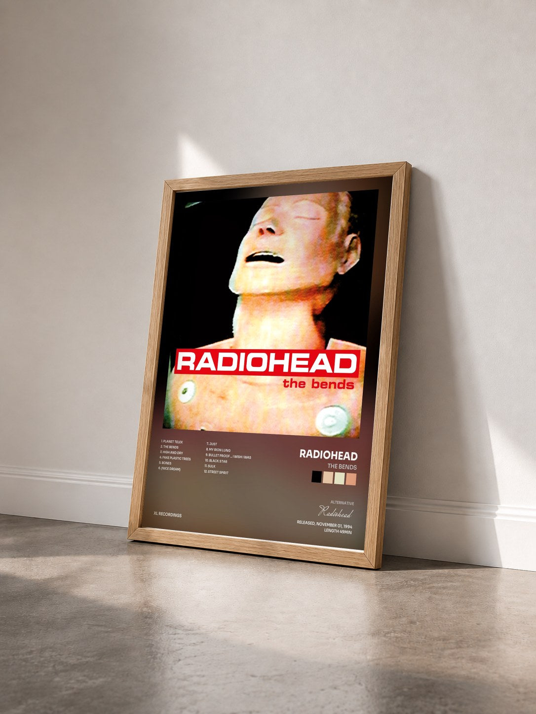 #bois Tableau de l'album The Bends de Radiohead vu de trois quarts, cadre en bois brut