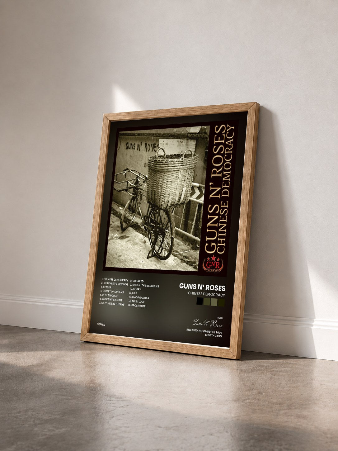 #bois Tableau de l'album Chinese Democracy de Guns N' Roses vu de trois quarts, cadre en bois brut
