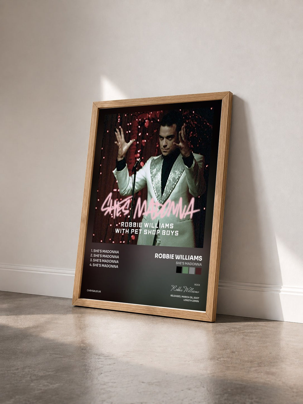 #bois Tableau de l'album She's Madonna de Robbie Williams vu de trois quarts, cadre en bois brut