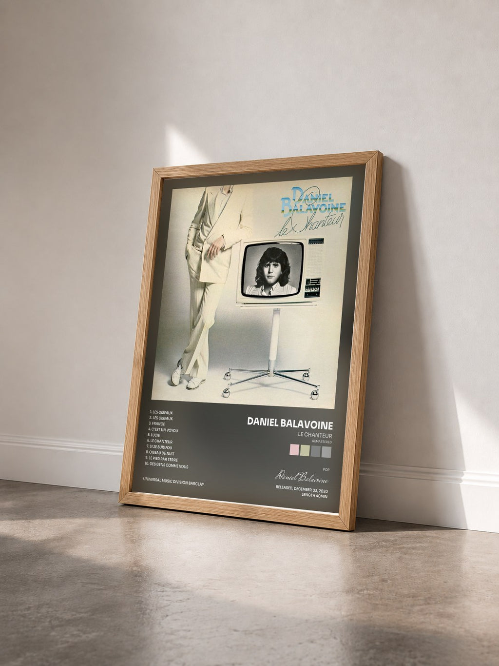 #bois Tableau de l'album Le chanteur (Remastered) de Daniel Balavoine vu de trois quarts, cadre en bois brut