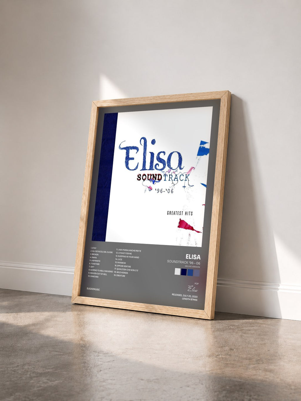 #bois Tableau de l'album Soundtrack '96 - 06 (Deluxe Version) de Elisa vu de trois quarts, cadre en bois brut