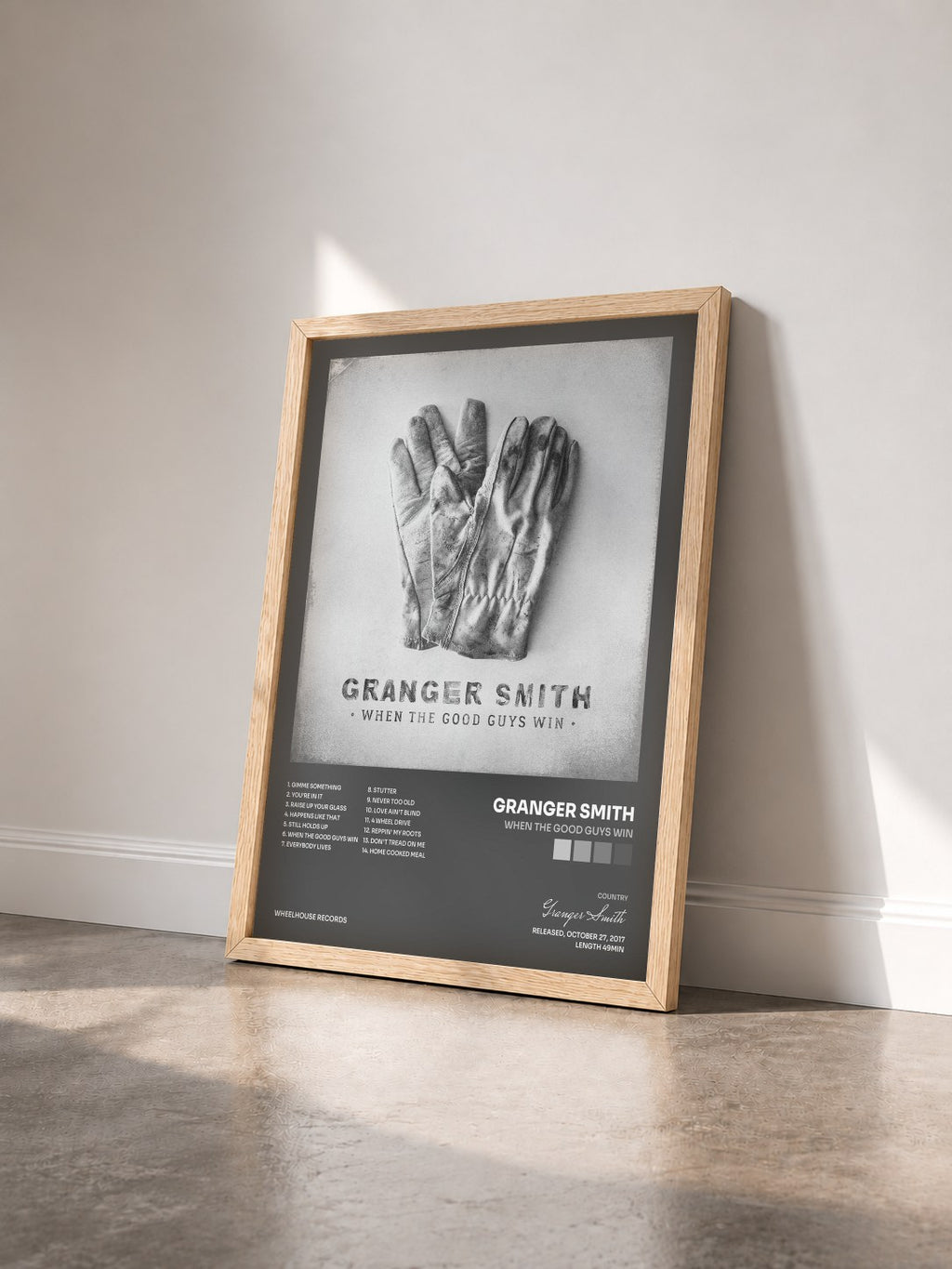 #bois Tableau de l'album When The Good Guys Win de Granger Smith vu de trois quarts, cadre en bois brut