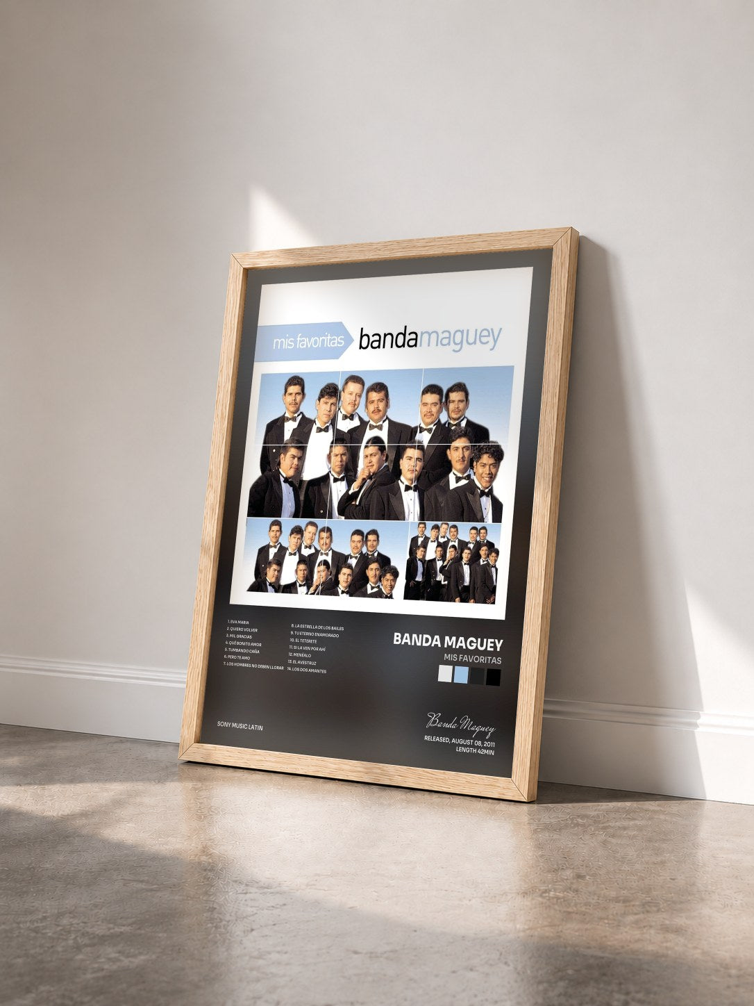 #bois Tableau de l'album Mis Favoritas de Banda Maguey vu de trois quarts, cadre en bois brut