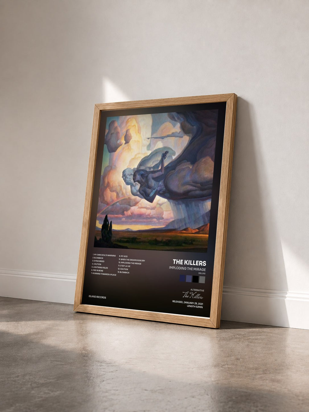 #bois Tableau de l'album Imploding The Mirage (Deluxe) de The Killers vu de trois quarts, cadre en bois brut