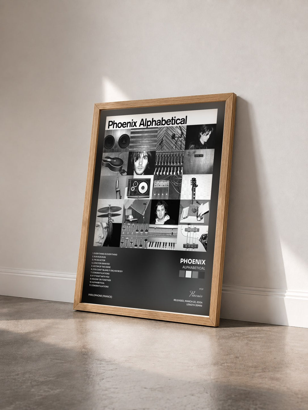 #bois Tableau de l'album Alphabetical de Phoenix vu de trois quarts, cadre en bois brut