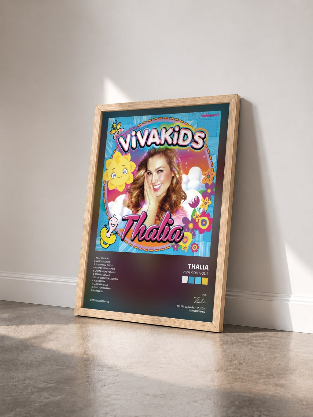 #bois Tableau de l'album Viva Kids, Vol. 1 de Thalia vu de trois quarts, cadre en bois brut
