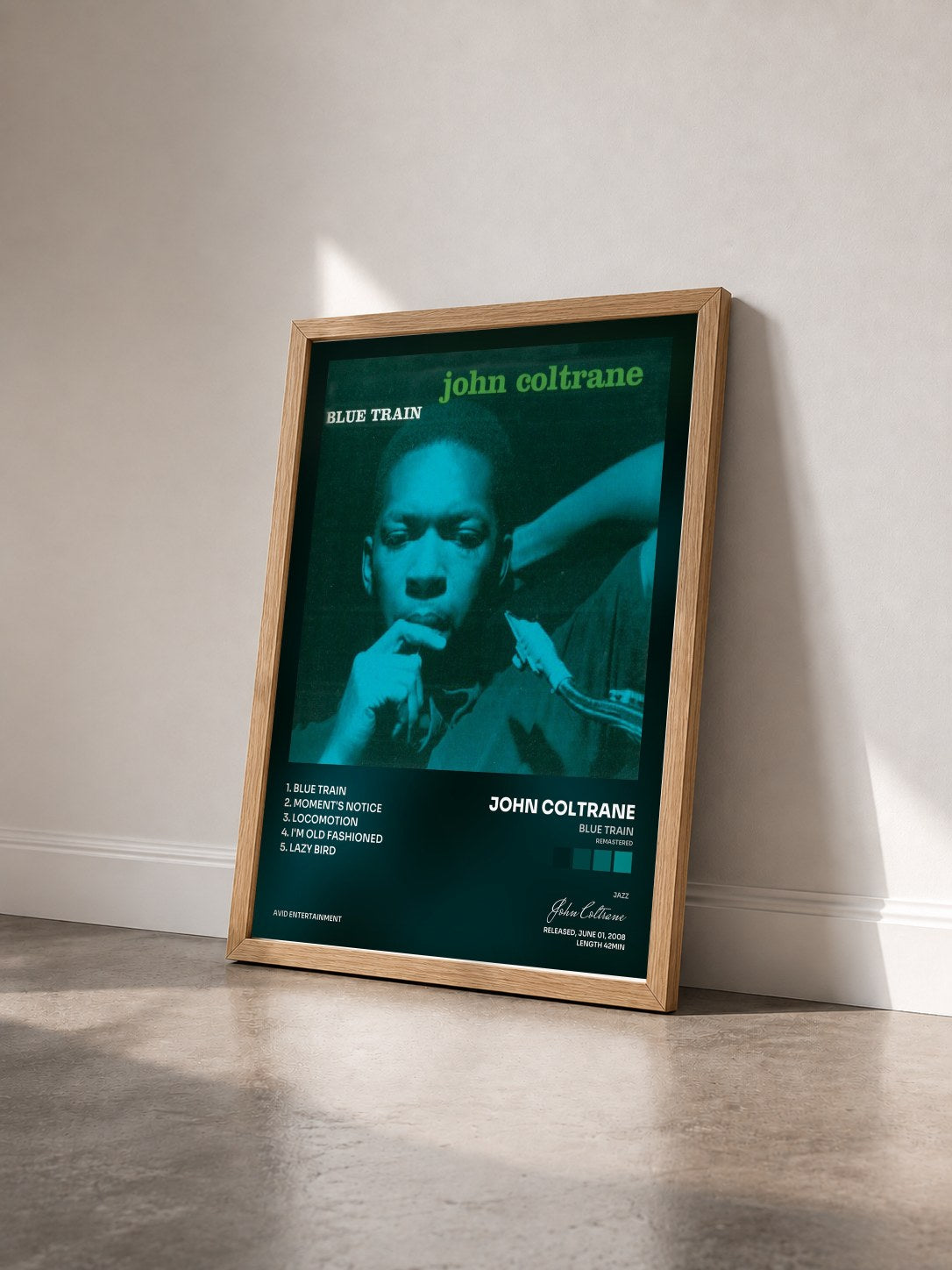 #bois Tableau de l'album Blue Train (Remastered) de John Coltrane vu de trois quarts, cadre en bois brut