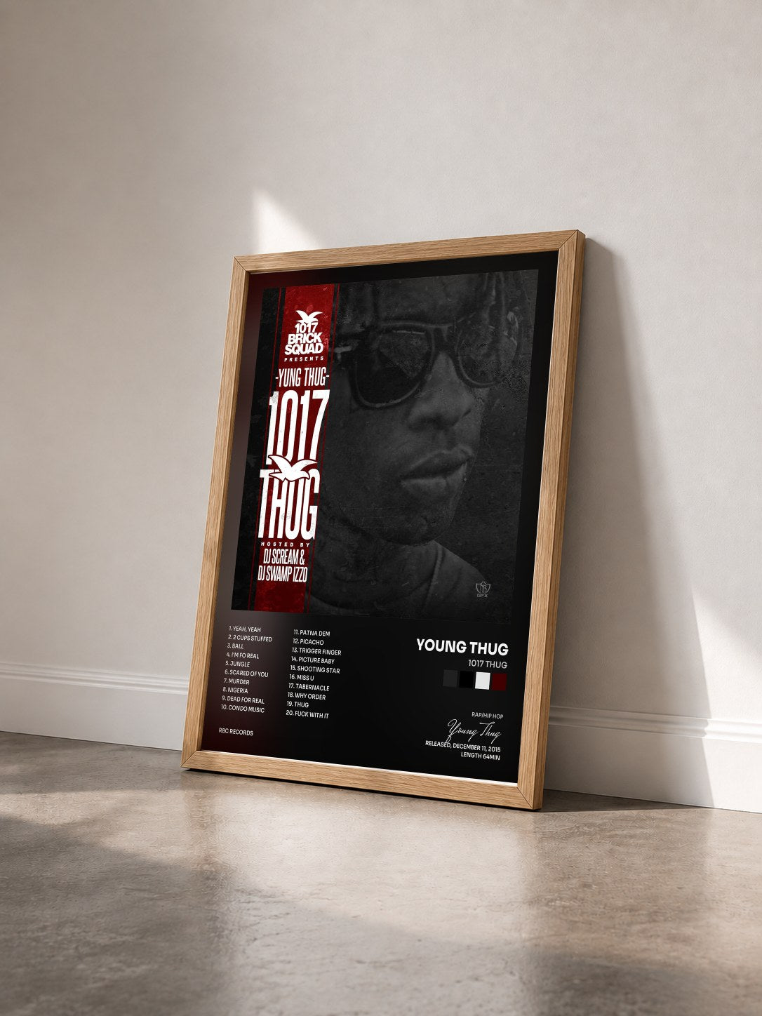 #bois Tableau de l'album 1017 Thug de Young Thug vu de trois quarts, cadre en bois brut