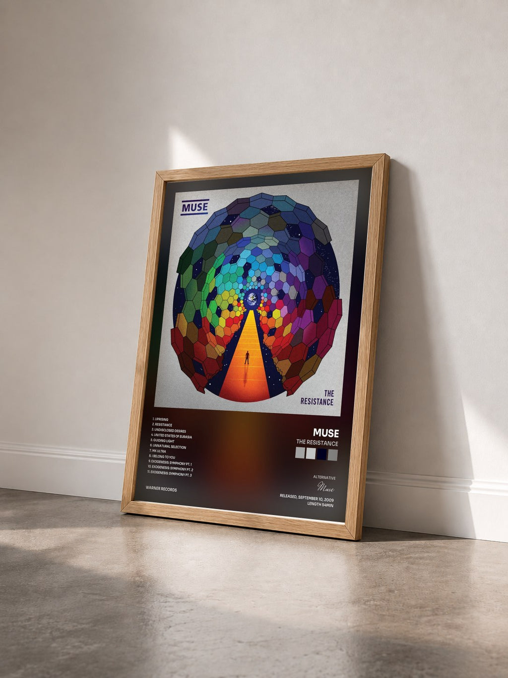 #bois Tableau de l'album The Resistance de Muse vu de trois quarts, cadre en bois brut
