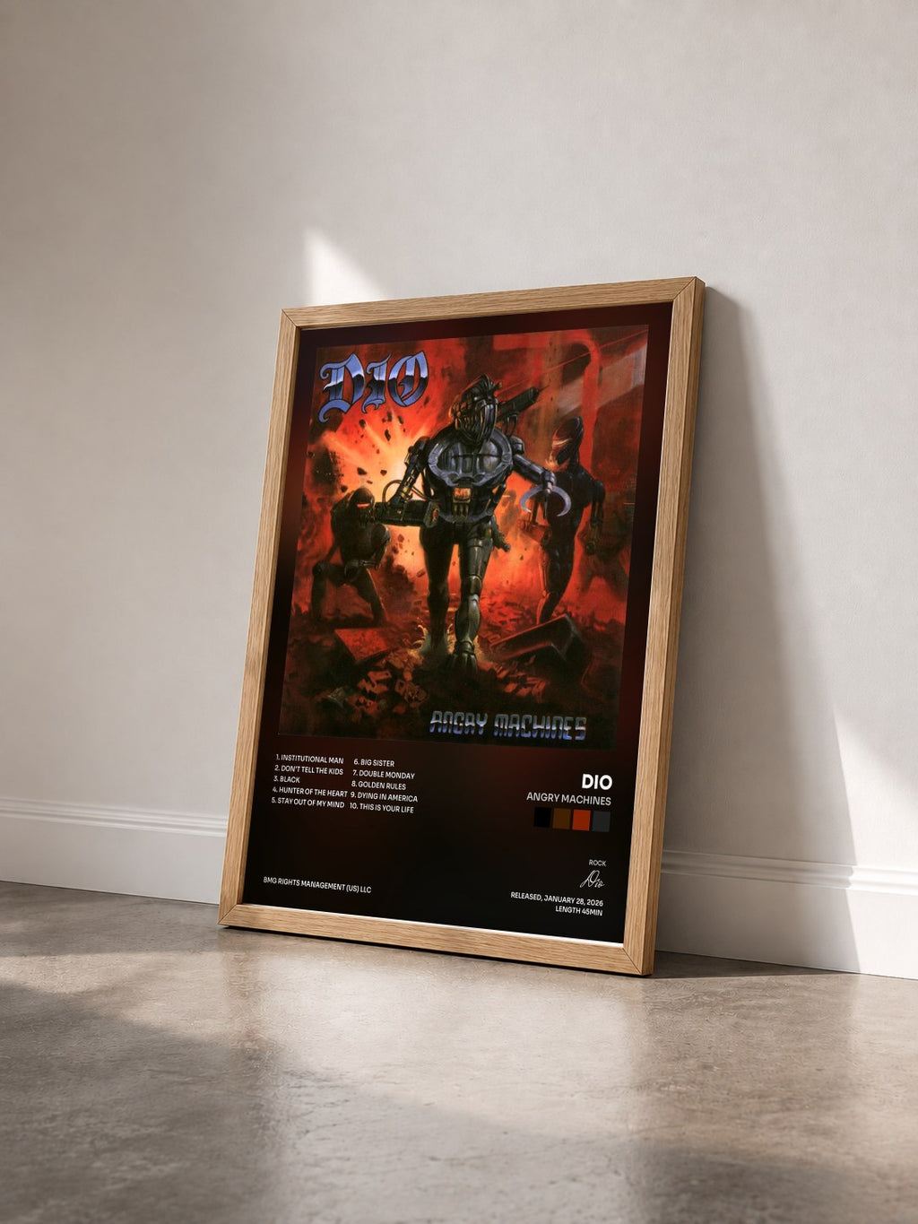 #bois Tableau de l'album Angry Machines de Dio vu de trois quarts, cadre en bois brut