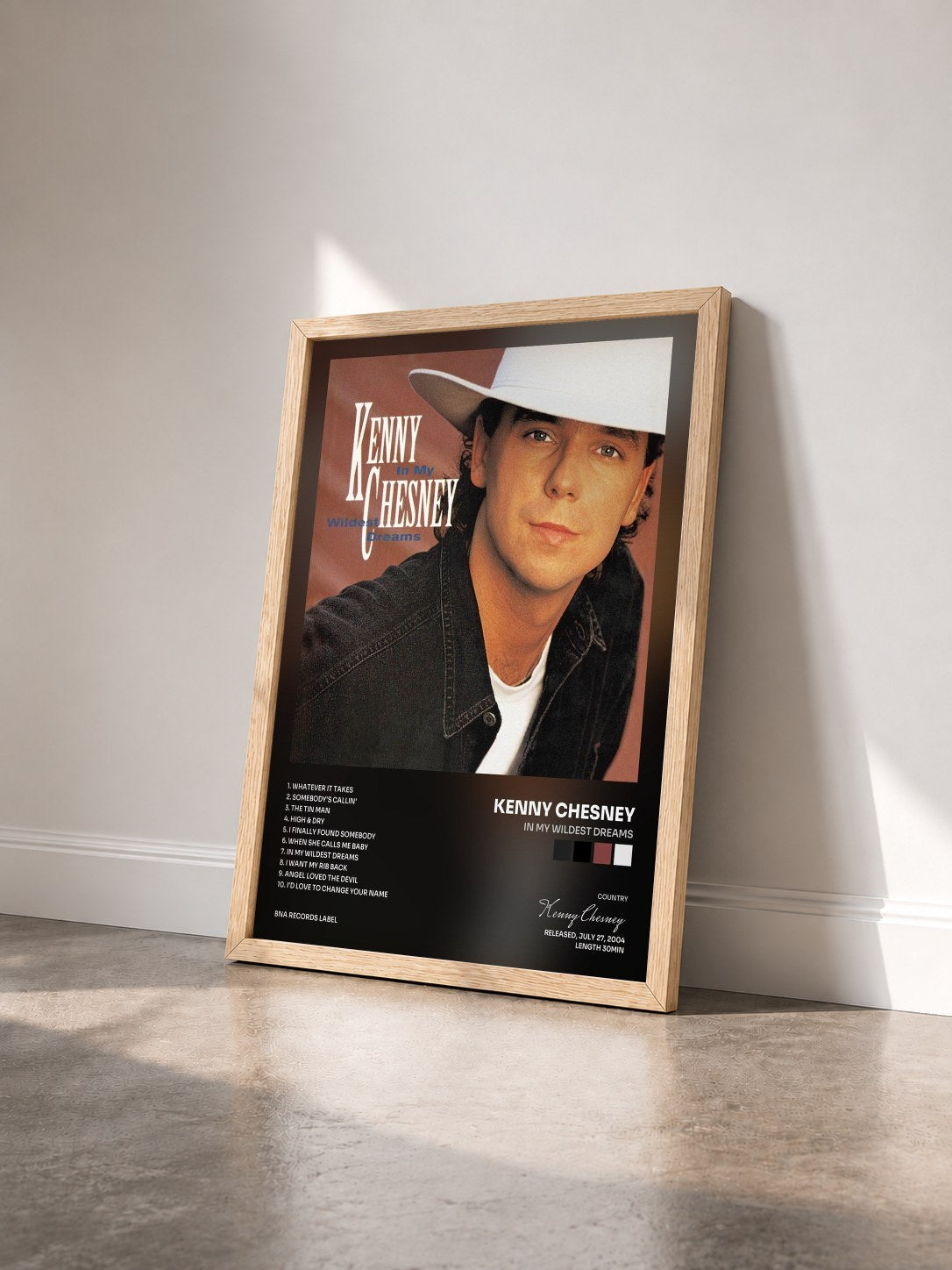#bois Tableau de l'album In My Wildest Dreams de Kenny Chesney vu de trois quarts, cadre en bois brut