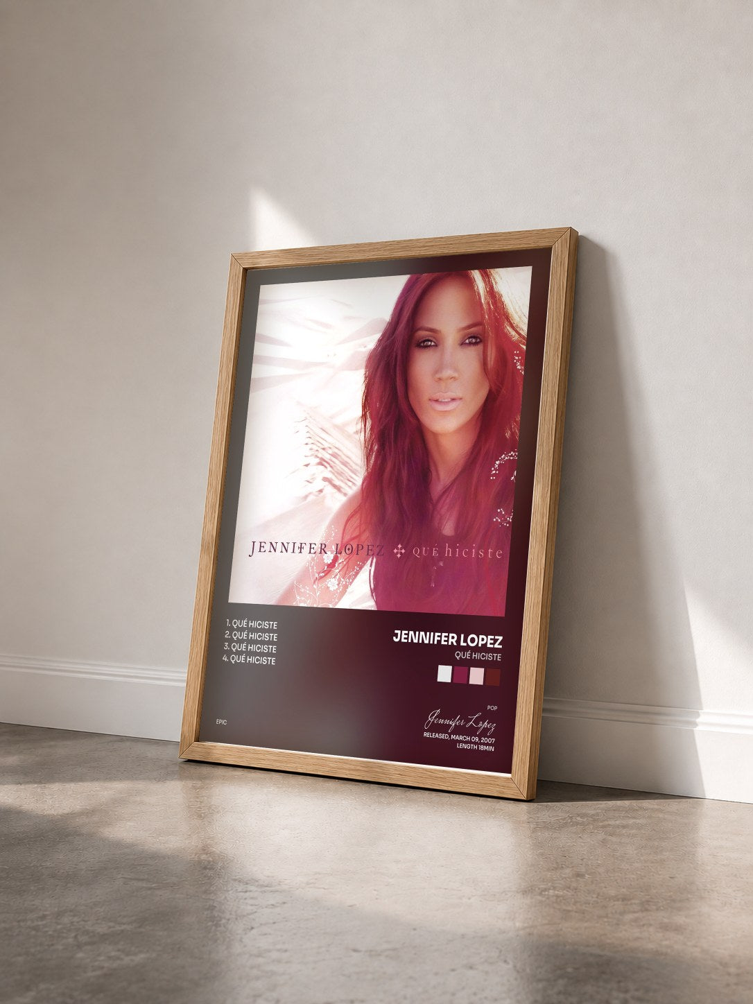 #bois Tableau de l'album Qué Hiciste de Jennifer Lopez vu de trois quarts, cadre en bois brut