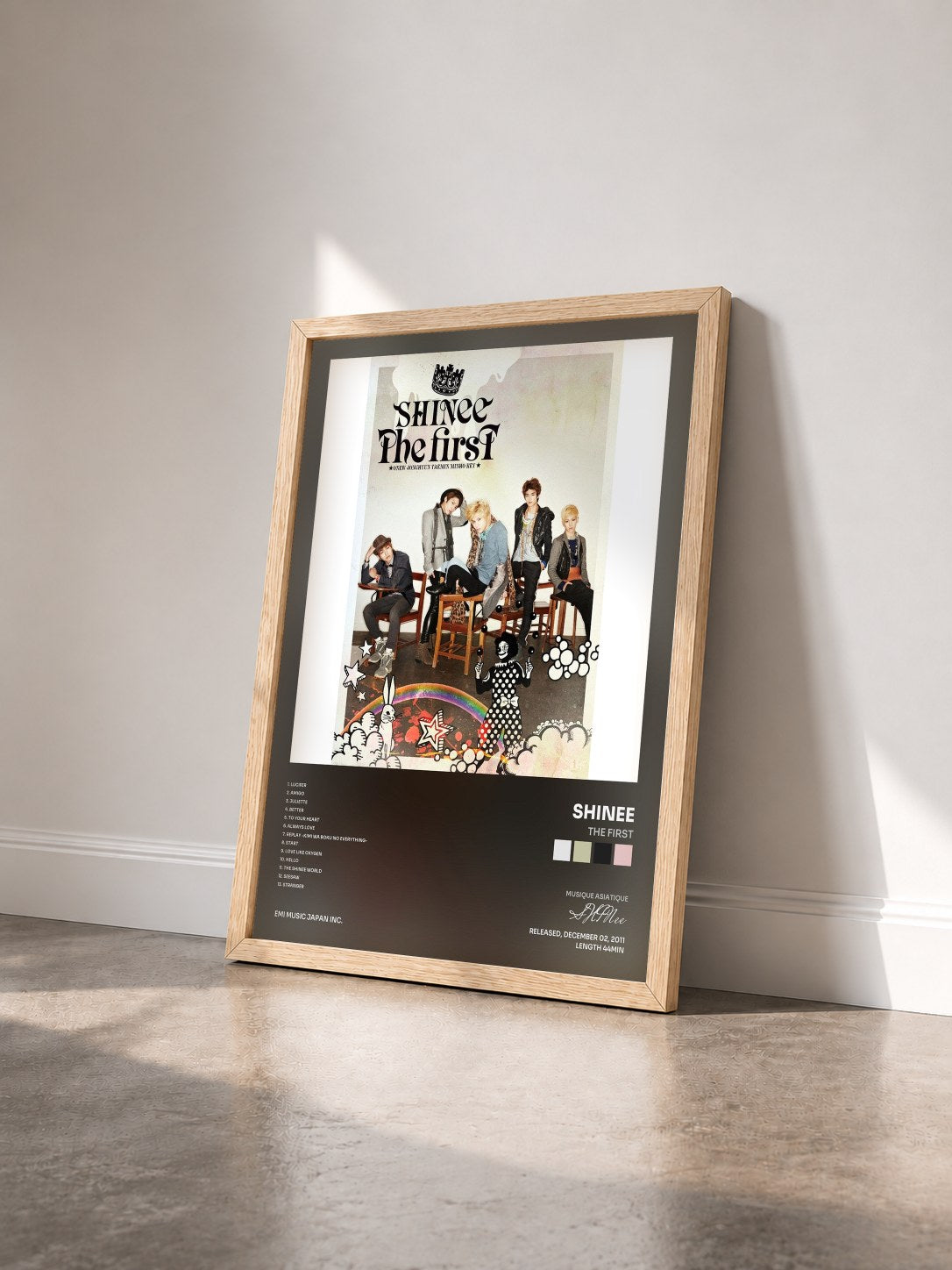 #bois Tableau de l'album The First de SHINee vu de trois quarts, cadre en bois brut