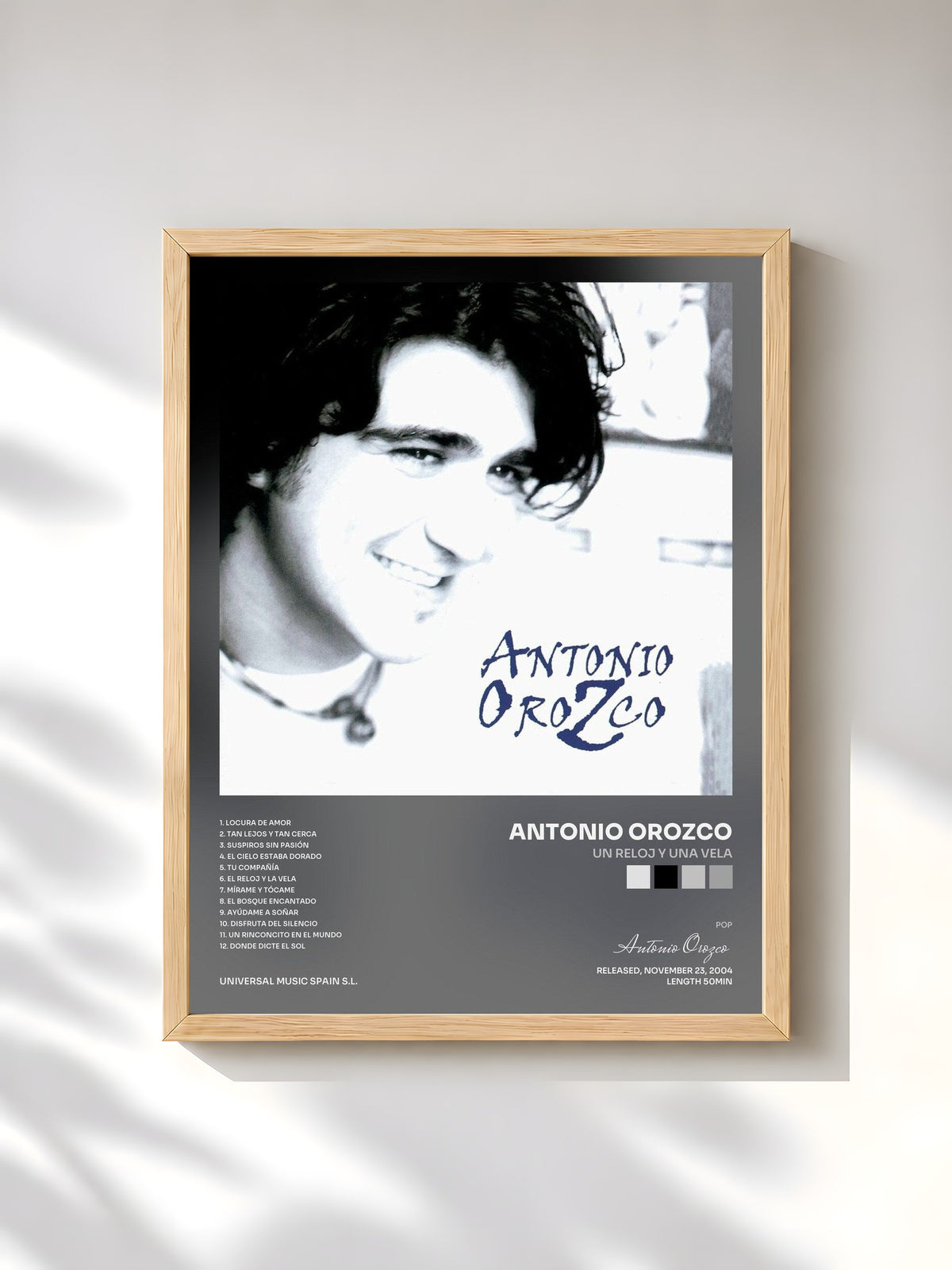 #bois Tableau de l'album Un Reloj Y Una Vela de Antonio Orozco, cadre en bois brut, imprimé et encadré en France