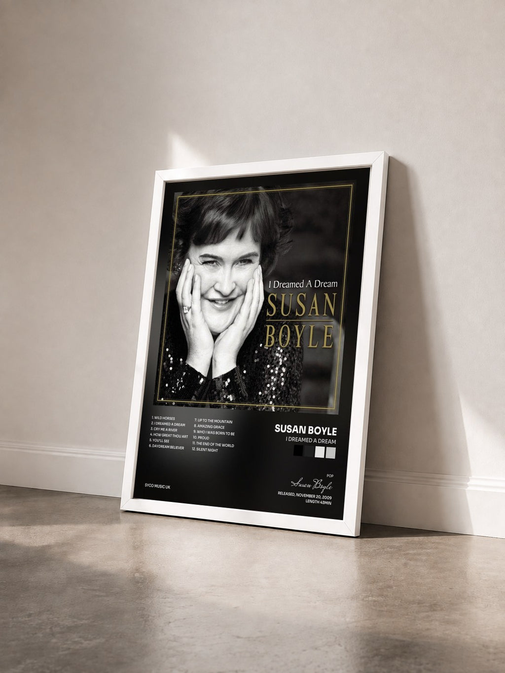 #blanc Tableau de l'album I Dreamed A Dream de Susan Boyle vu de trois quarts, cadre blanc