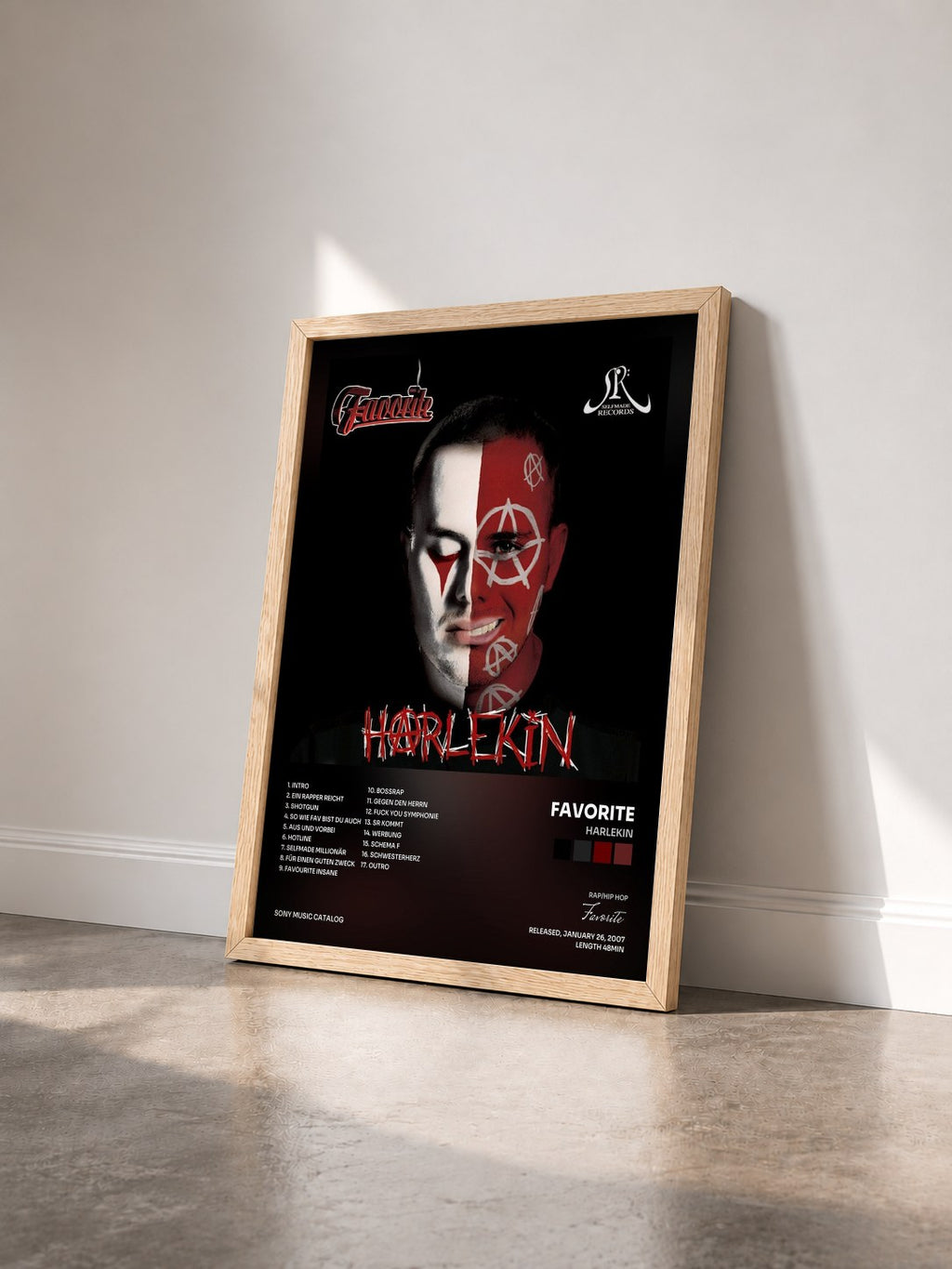 #bois Tableau de l'album Harlekin de Favorite vu de trois quarts, cadre en bois brut