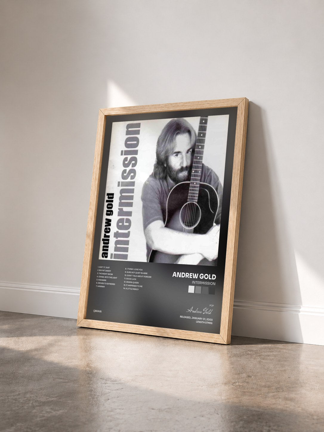 #bois Tableau de l'album Intermission de Andrew Gold vu de trois quarts, cadre en bois brut
