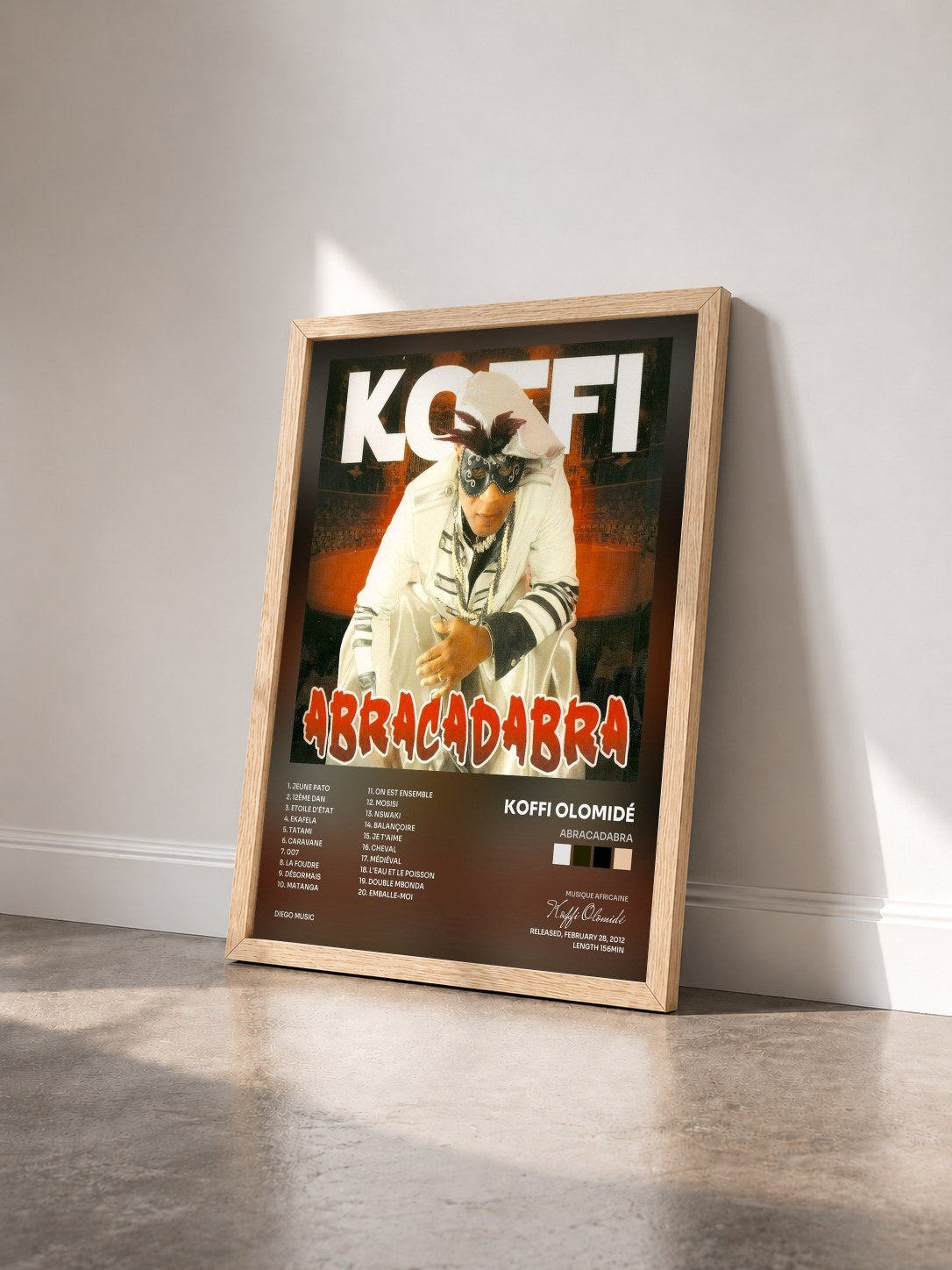 #bois Tableau de l'album Abracadabra de Koffi Olomidé vu de trois quarts, cadre en bois brut
