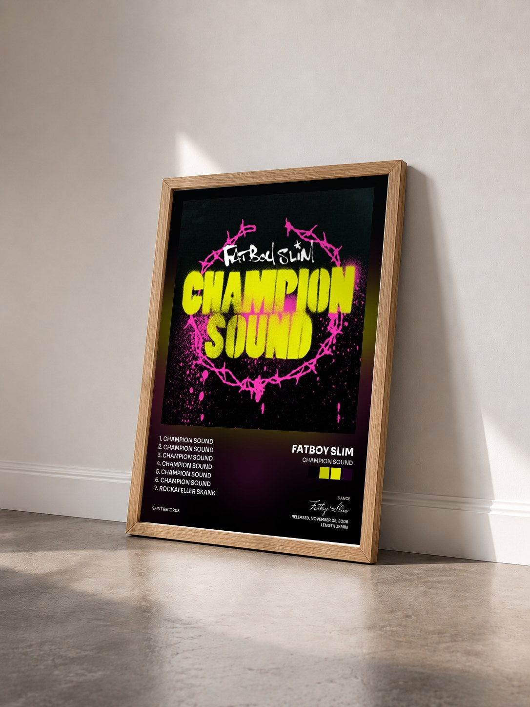 #bois Tableau de l'album Champion Sound de Fatboy Slim vu de trois quarts, cadre en bois brut