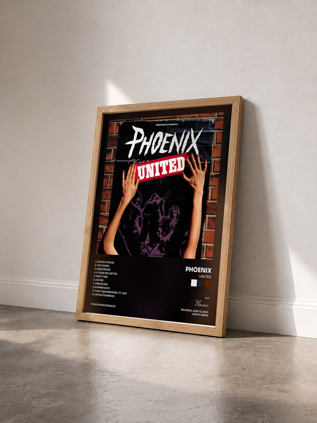 #bois Tableau de l'album United de Phoenix vu de trois quarts, cadre en bois brut