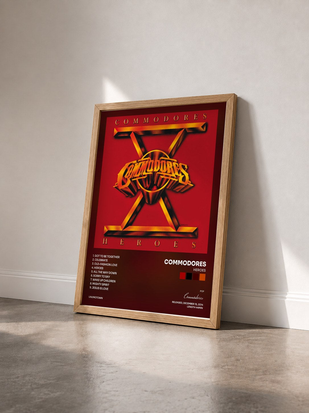 #bois Tableau de l'album Heroes de Commodores vu de trois quarts, cadre en bois brut