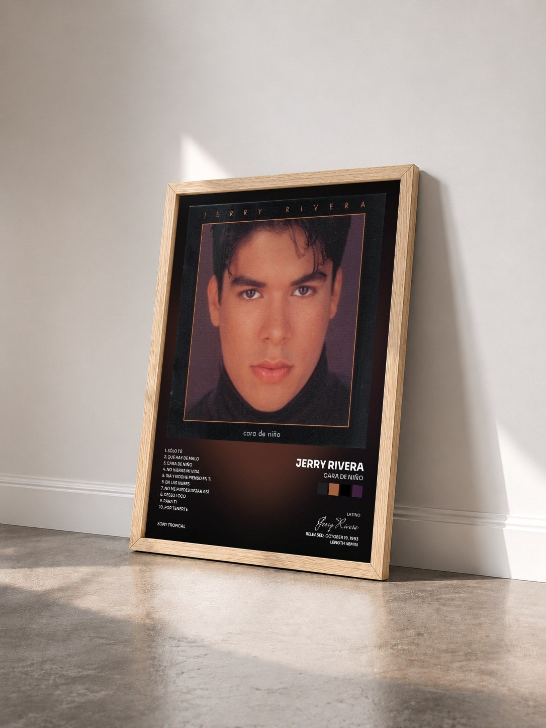 #bois Tableau de l'album Cara De Niño de Jerry Rivera vu de trois quarts, cadre en bois brut