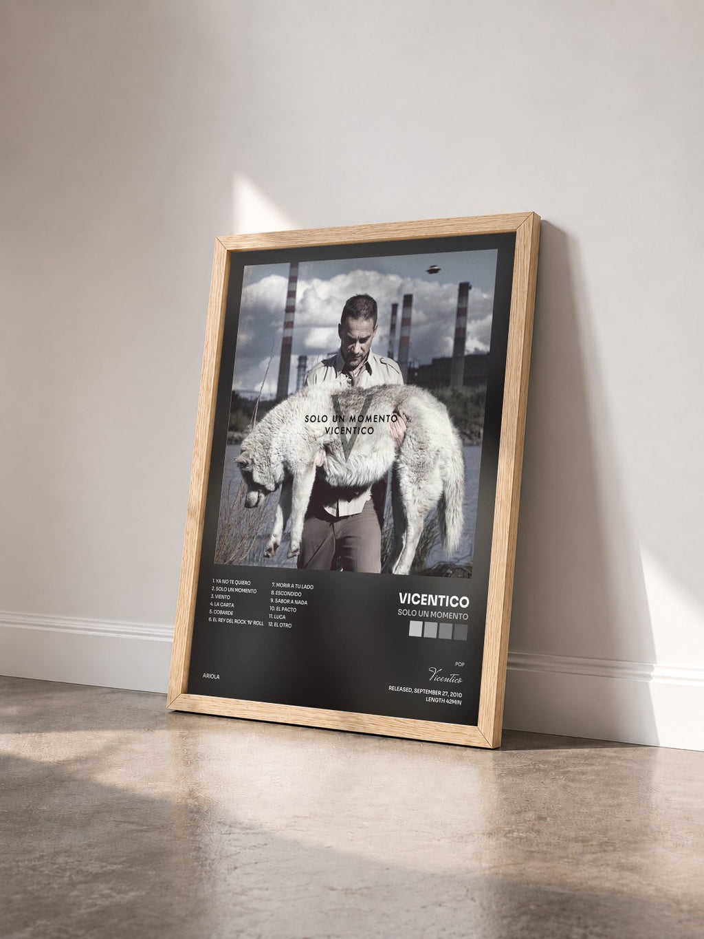 #bois Tableau de l'album Solo Un Momento de Vicentico vu de trois quarts, cadre en bois brut