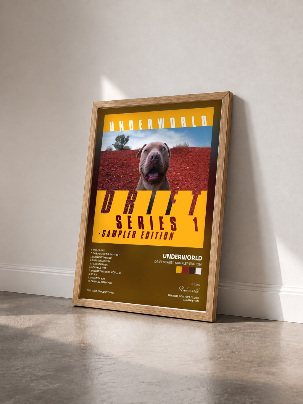 #bois Tableau de l'album DRIFT Series 1 Sampler Edition de Underworld vu de trois quarts, cadre en bois brut