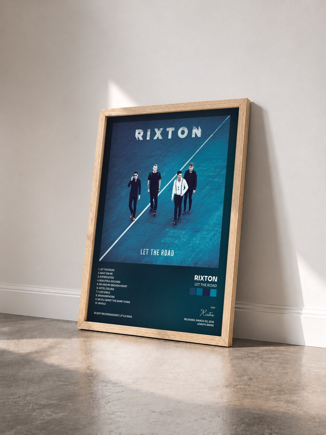 #bois Tableau de l'album Let The Road de Rixton vu de trois quarts, cadre en bois brut