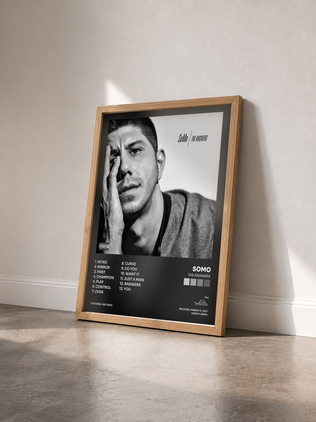 #bois Tableau de l'album The Answers de SoMo vu de trois quarts, cadre en bois brut
