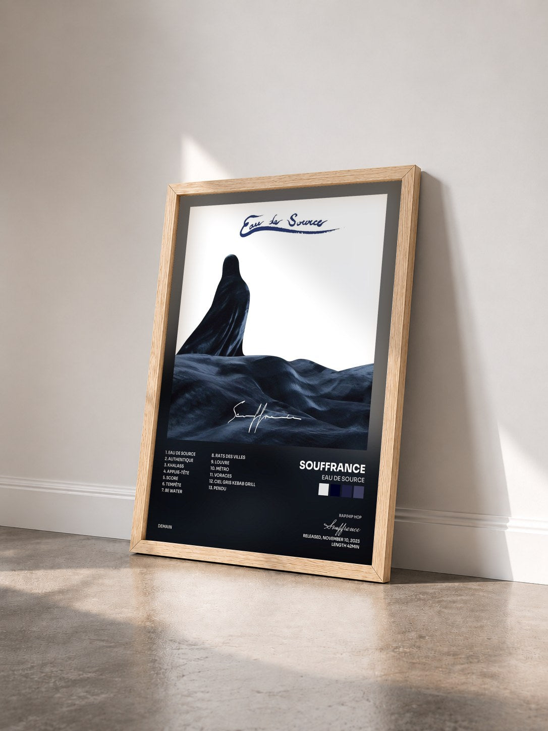 #bois Tableau de l'album Eau de source de Souffrance vu de trois quarts, cadre en bois brut