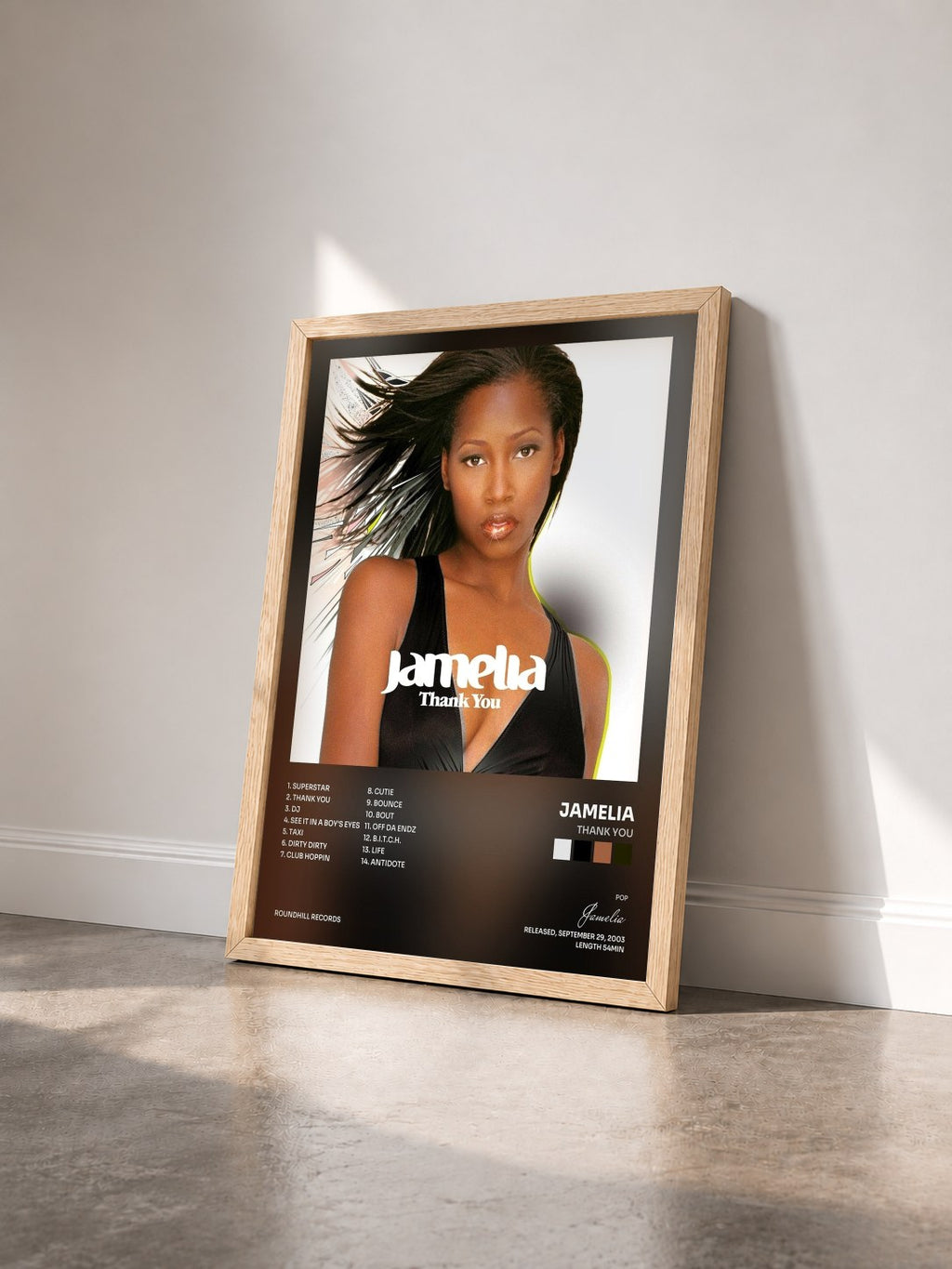 #bois Tableau de l'album Thank You de Jamelia vu de trois quarts, cadre en bois brut